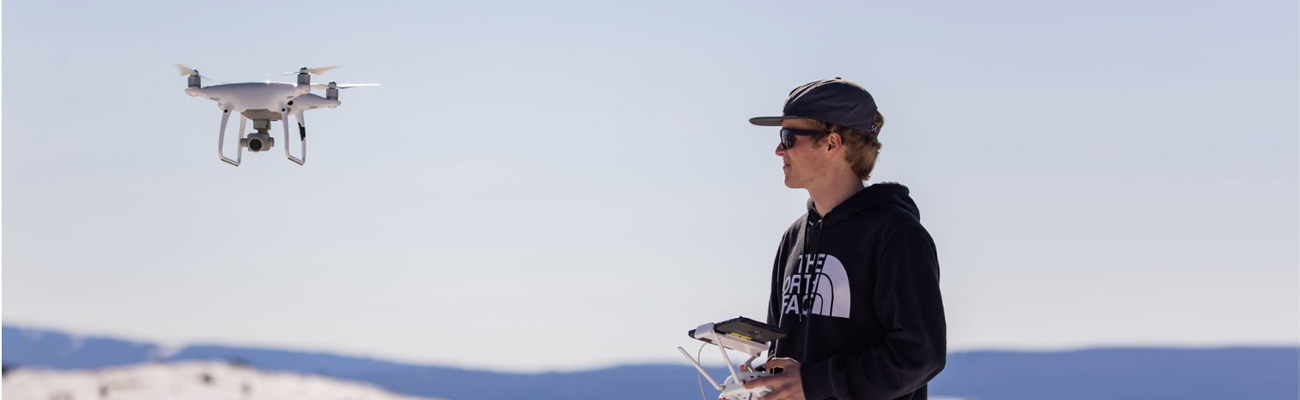 Student flying a drone