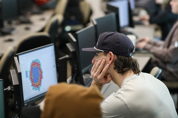 Student looking at a computer screen