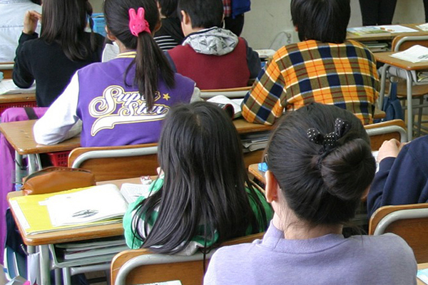 Elementary school students sitting in a classroom