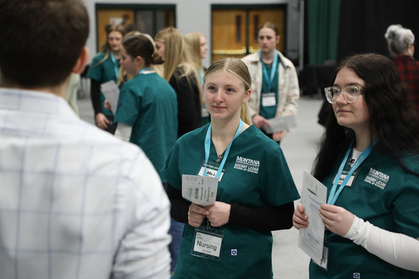 Nursing students speaking to an employer at Career Fair