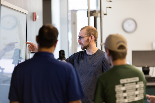 An instructor teaching students.