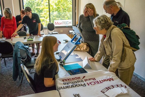 Customers speaking to MonTech reps at the University of Montana.