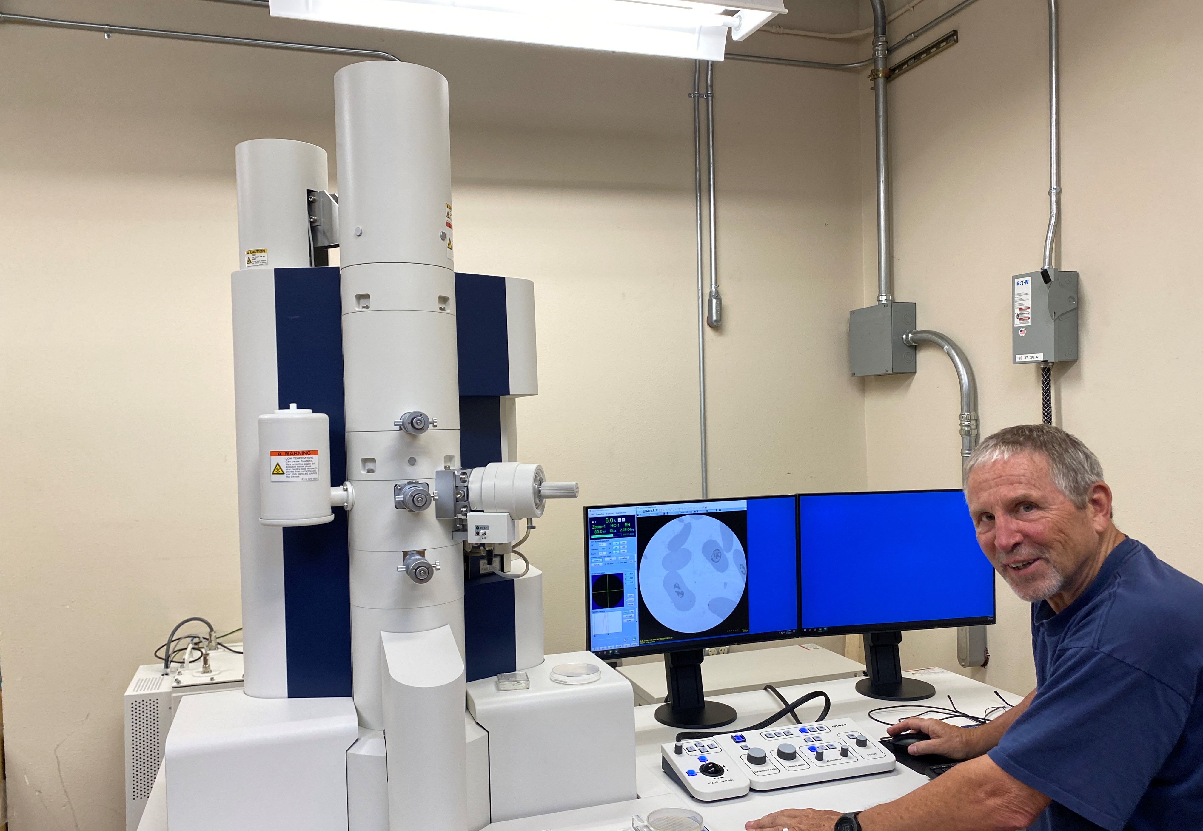 !Jim Driver at a microscope