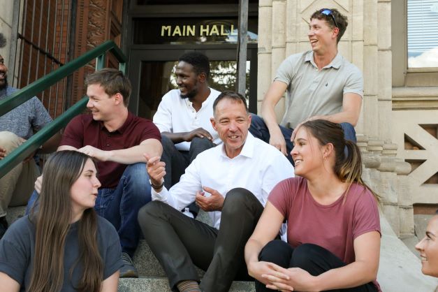 Group of people sitting on a staircase