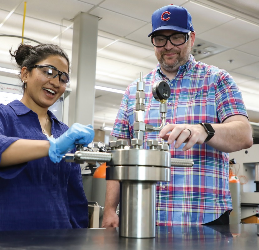 !Professor Richard LaDouceur works with a student