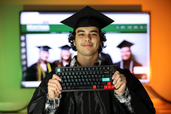 !webmaster Eddie pantoja in his cap and gown