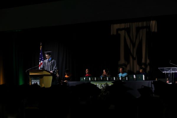 !A commencement speaker delivers their address. 