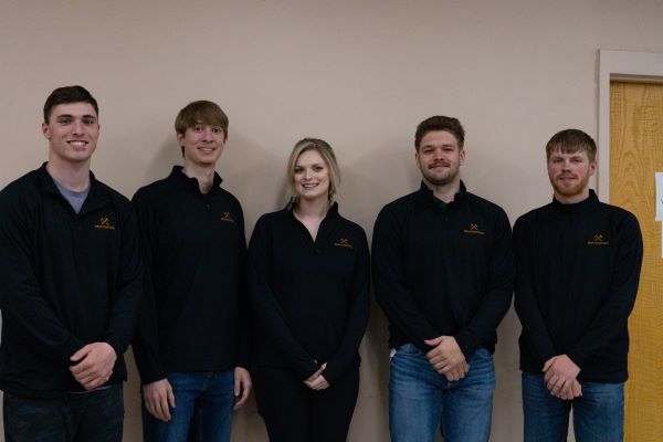!five students pose for a photo