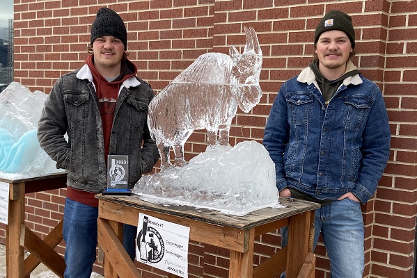!Heggem brothers with ice sculpture of mountain goat