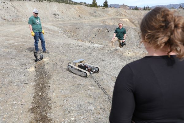 Students with a ground drone