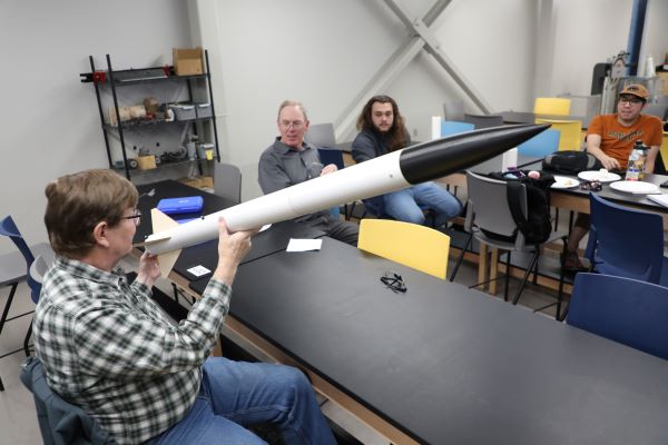 !AISES team works with rocket