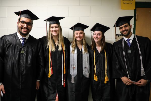 !students in caps and gowns