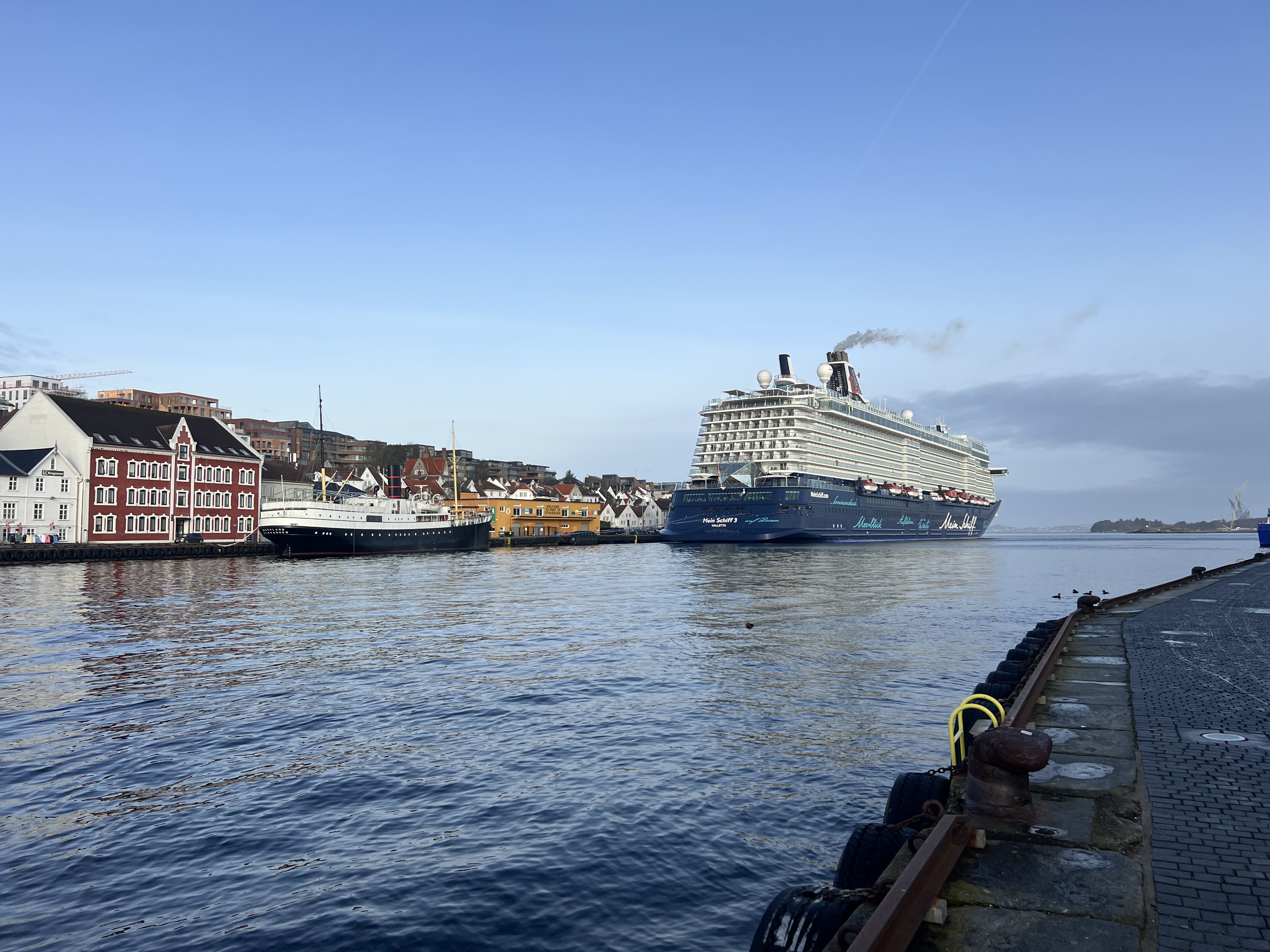 A large boat floats through Stavanger port