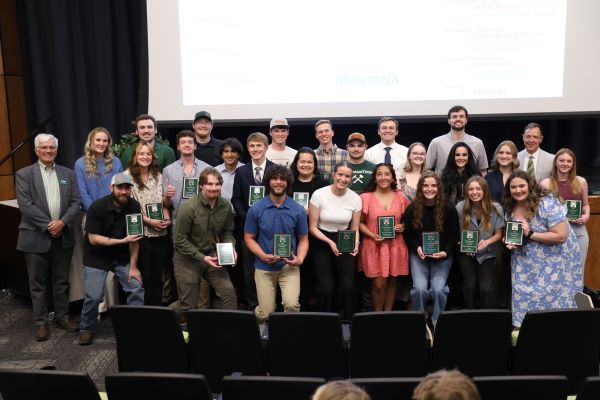 !A large group of students pose with their awards