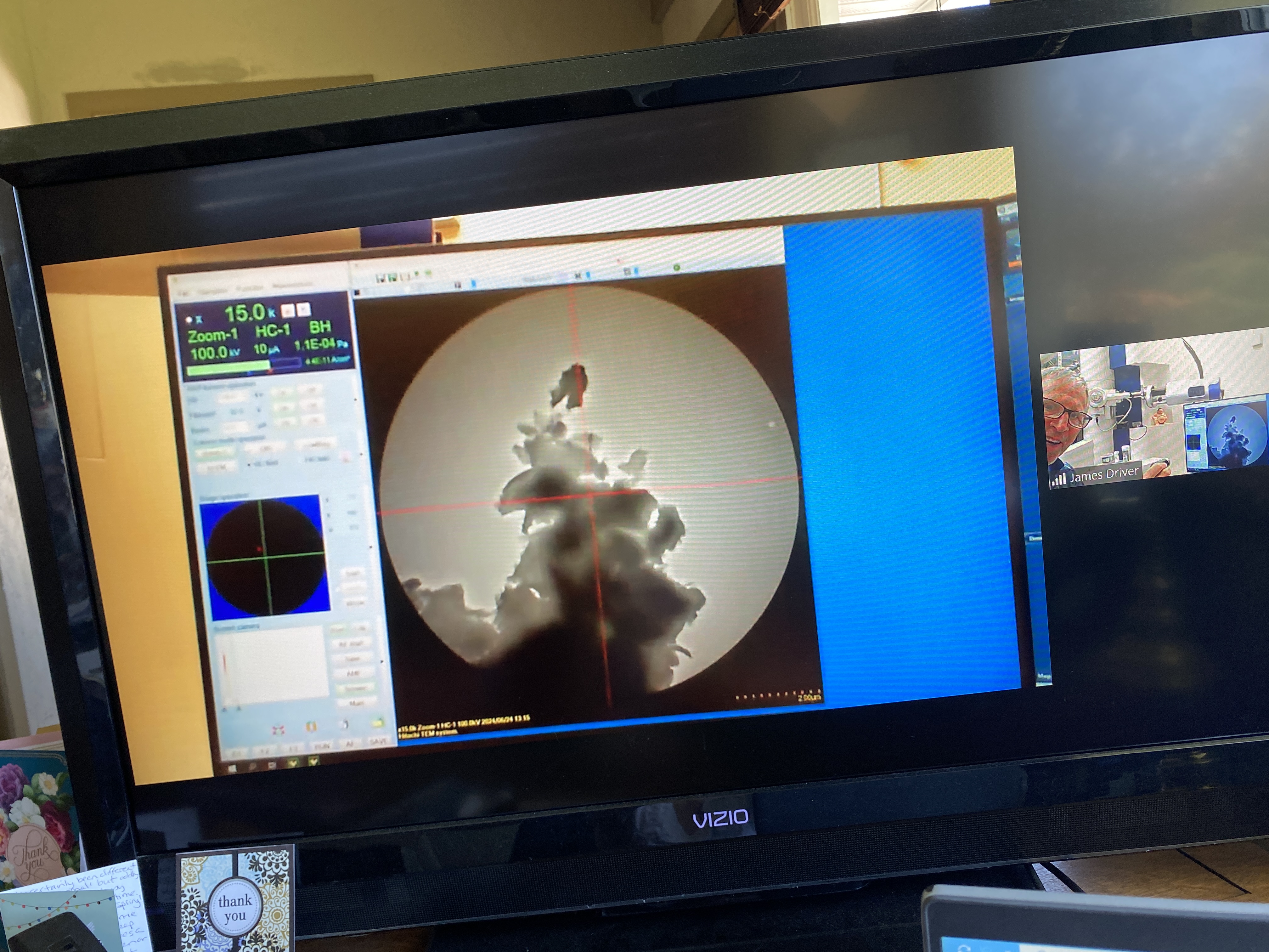 Image of a microscope on a a screen