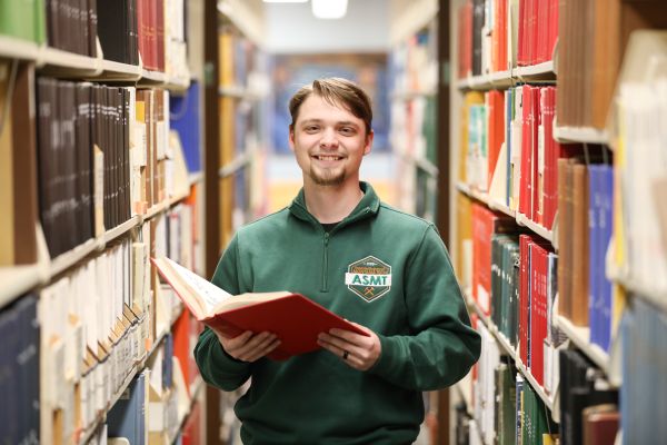 !Quinn Cox in the library