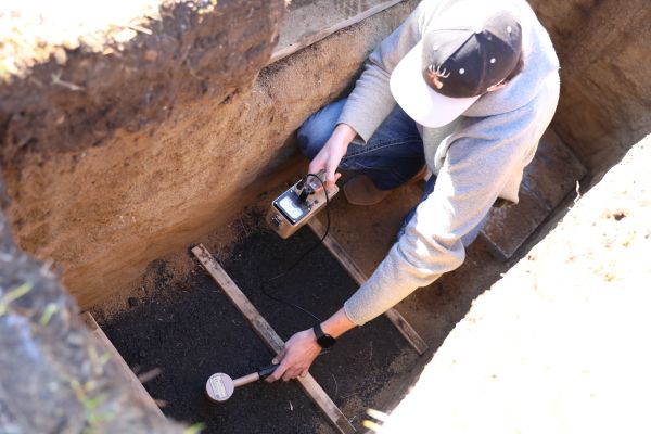A student uses an instrument to measure radon.