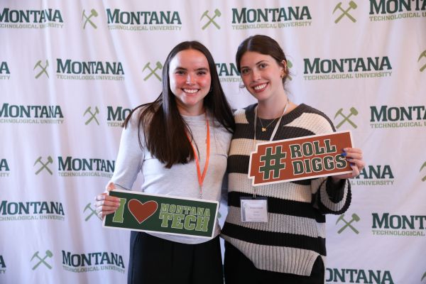Students hold Montana Tech signs