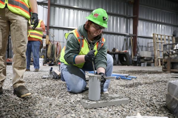 Students conduct concrete tests