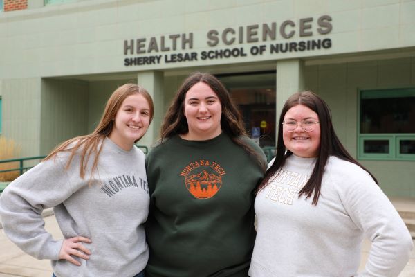 !Three nursing students in Montana Tech sweaters 