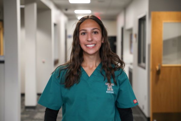 !Emily Ratz in scrubs 