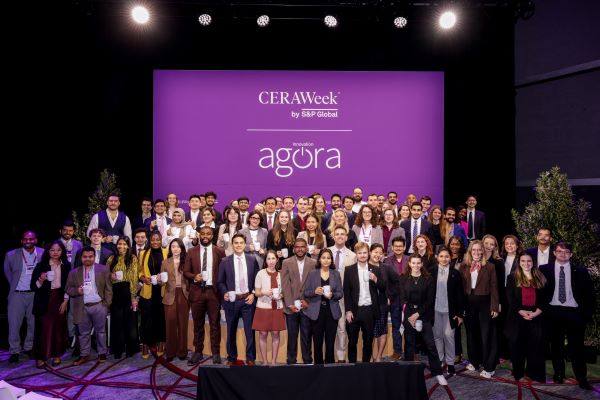 A large group of students pose together at CERAWeek