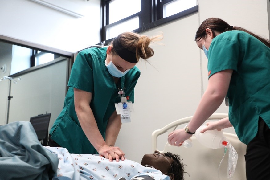 Nursing students simulating CPR