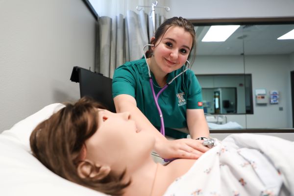 Emaleigh Packer works in the nursing simulation lab